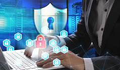 商人手使用移动PC与挂锁技术网络安全数据保护业务技术隐私概念