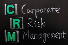 首字母缩写CRM企业风险管理写黑板上