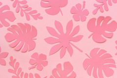热带叶子模式时尚的粉红色的热带叶子纸粉红色的背景平躺自顶向下作文有创意的纸艺术热带叶子模式时尚的粉红色的热带叶子纸粉红色的背景平躺自顶向下作文有创意的纸艺术