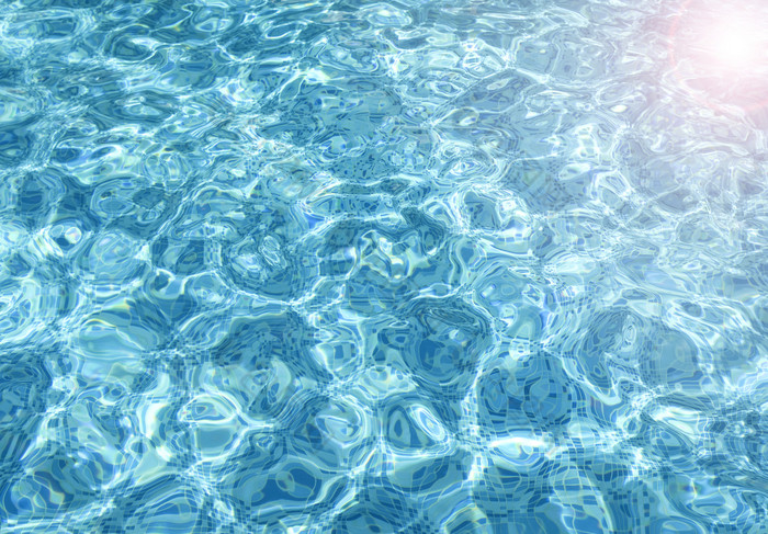 池水背景涟漪蓝色的透明的水游泳池与太阳反射前视图池水背景