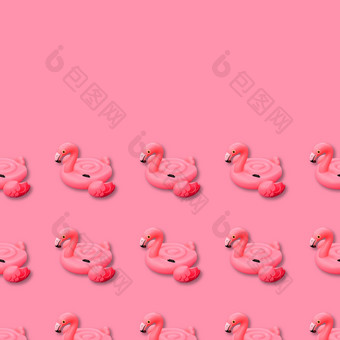 游泳池玩具形状粉红色的火烈鸟无缝的模式粉红色的背景火烈鸟充气减少出前视图平躺与复制空间游泳池玩具形状粉红色的火烈鸟无缝的模式火烈鸟充气减少出