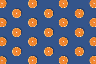 水果模式新鲜的<strong>明</strong>亮的橙色柑橘类片孤立的经典蓝色的背景平躺<strong>前</strong>视图流行艺术设计有创意的颜色的一年夏天概念最小的风格水果模式新鲜的<strong>明</strong>亮的橙色柑橘类片孤立的经典蓝色的背景平躺<strong>前</strong>视图