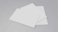白色礼物卡信贷卡模型叠加灰色表格背景对象背景为业务品牌演讲模板打印英寸纸大小封面插图呈现