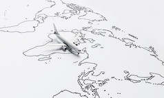 飞机苍蝇以上白色纸地图的世界旅行背景旅行和旅游热概念插图呈现