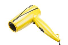 电手持头发干燥机为头发沙龙理发师商店孤立的的白色背景黄色的可折叠的头发干燥机孤立的的白色背景