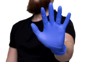男人。rsquo手蓝色的医疗手套与的单词保持首页自我隔离检疫新冠病毒冠状病毒停止男人。rsquo手蓝色的医疗手套与的单词保持首页自我隔离检疫新冠病毒冠状病毒