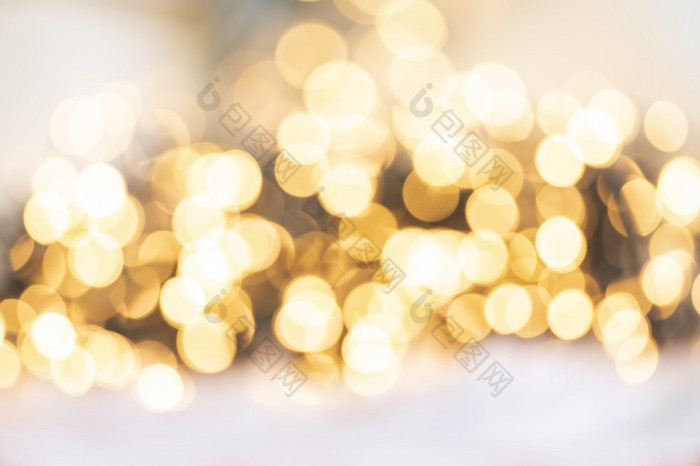 散焦黄金光摘要圣诞节假期背景纹理闪闪发光的黄色的模糊温暖的音调色彩斑斓的散焦黄金光摘要圣诞节假期背景纹理闪闪发光的黄色的模糊温暖的音调