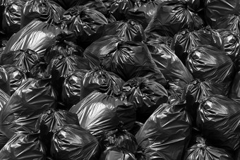 背景垃圾袋黑色的本垃圾转储本垃圾垃圾垃圾塑料袋桩垃圾垃圾垃圾纹理