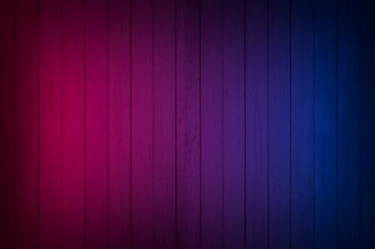 霓虹灯光木墙纹理背景照明效果红色的和蓝色的霓虹灯背景