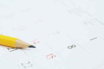日历页面数量铅笔黄色的马克的想要的日期提醒内存时间轴组织时间表任命和会议提醒规划为业务旅行假期规划概念