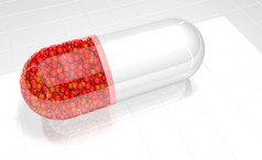 关闭白色塑料胶囊与透明的红色的一半完整的红色的球体白色反光表面插图关闭白色胶囊与透明的红色的一半完整的红色的球体白色反光表面插图