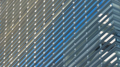 方法的玻璃窗户反映蓝色的天空现代建筑摘要背景