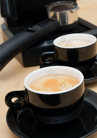 两个杯表示咖啡与咖啡<strong>机</strong>背景