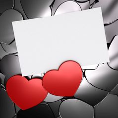 两个红色的心形状在灰色的象征爱激情卡与空白空间为消息前面视图爱概念