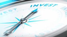 概念上的指南针与针指出的词投资业务背景图像金融概念投资概念