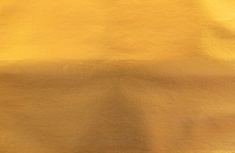黄金箔纸纹理背景闪亮的奢侈品箔水平与独特的设计纸软<strong>自然风格</strong>为审美有创意的设计