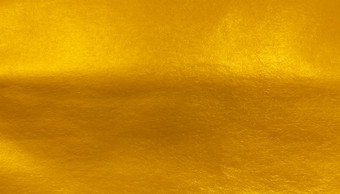 黄金箔纸纹理背景闪亮的奢侈品箔水平与独特的设计纸软<strong>自然风格</strong>为审美有创意的设计
