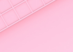 呈现甜蜜的软粉红色的广场模式设计墙背景