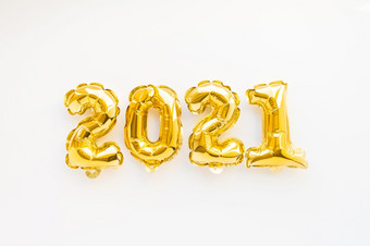 快乐新一年庆祝活动黄金和银箔气球数字和五彩纸屑粉红色的背景平躺快乐新一年庆祝活动黄金箔气球数字和五彩纸屑白色背景平躺