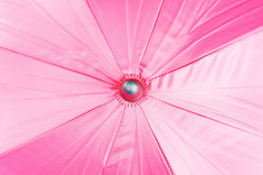 关闭销头前视图粉红色的伞