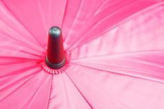 关闭销头前视图粉红色的伞