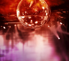 色彩斑斓的迪斯科镜子球灯晚上俱乐部背景