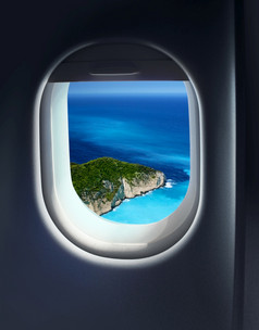 接近纸牌天堂岛假期目的地飞机飞机窗口天空视图接近假期目的地
