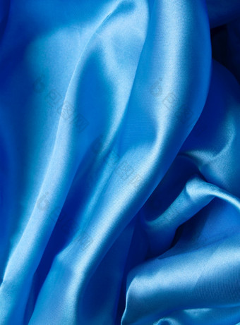 光滑的优雅的黑暗蓝色的丝绸可以使用背景光滑的优雅的蓝色的丝绸可以使用背景