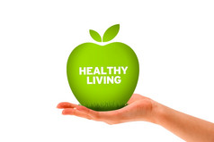 手持有绿色健康的生活苹果