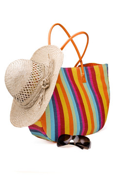 海滩项目色彩斑斓的条纹袋太阳镜而且稻草帽子海滩项目