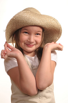 年轻的女孩稻草帽子