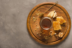 前视图蜂蜜Jar与食物蜜匙决议和高质量美丽的照片前视图蜂蜜Jar与食物蜜匙高质量美丽的照片概念