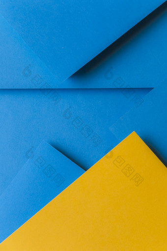 有创意的安排黄色的蓝色的彩色的纸创建摘要背景决议和高质量美丽的照片有创意的安排黄色的蓝色的彩色的纸创建摘要背景高质量美丽的照片概念
