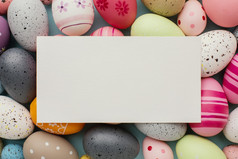 前视图色彩斑斓的复活节鸡蛋与纸