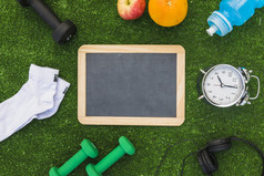 空白木板岩与体育运动设备健康的水果绿色的地盘