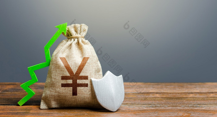日元元钱袋与盾和绿色箭头安全安全投资金融系统稳定增加最大量保证存款保险补偿