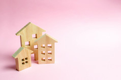 木房子粉红色的背景的概念的城市小镇投资真正的房地产购买房子管理和业务管理市场报道建设建筑