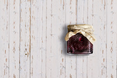 前视图树莓小时Jar孤立的白色木背景合适的为你的设计项目