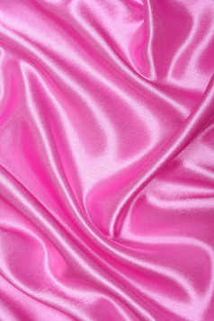 光滑的优雅的粉红色的丝绸可以使用背景