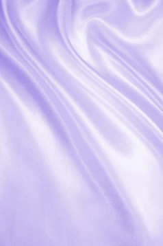 光滑的优雅的淡紫色丝绸缎可以使用背景