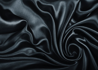 光滑的优雅的黑色的丝绸缎纹理可以使用<strong>背景</strong>