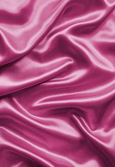 光滑的优雅的粉红色的丝绸缎纹理可以使用背景