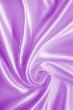 光滑的优雅的淡紫色丝绸缎纹理可以使用背景