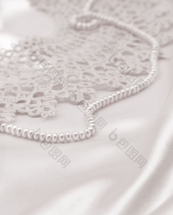 光滑的优雅的金丝绸缎与珍珠和花边可以使用婚礼背景乌贼健美的复古的风格