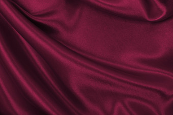 光滑的优雅的粉红色的丝绸缎奢侈品布纹理可以使用摘要背景<strong>豪华</strong>的情人节一天背景设计