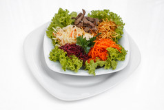 新鲜的沙拉新鲜的蔬菜沙拉与片肉拍摄表白色塑料特写镜头