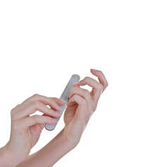 女人抛光指甲使用的指甲文件孤立的在白色广场