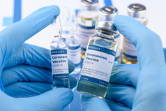 冠状病毒新冠病毒疫苗瓶科学家手概念研究为新小说电晕病毒免疫接种药物