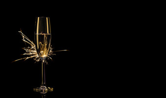 玻璃香槟孟加拉灯黑色的背景轮廓的概念庆祝<strong>活动</strong>新一年庆祝<strong>活动</strong>玻璃香槟孟加拉灯
