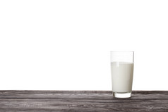 玻璃牛奶木表格孤立的白色背景玻璃牛奶木表格